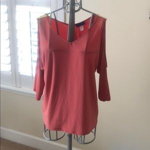 Coral top with shoulder cut-outs